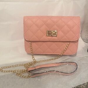 Petal pink NWOT crossbody with turn lock